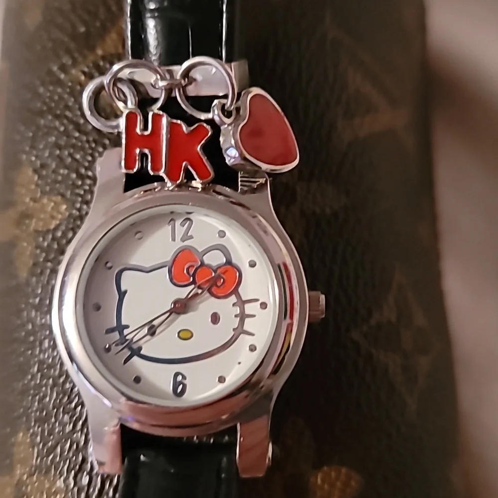 NWOT Sanrio Hello Kitty Womens Charm Quartz Watch Black Leather Band Silver Case